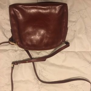 Hobo crossbody bag. Color brown.